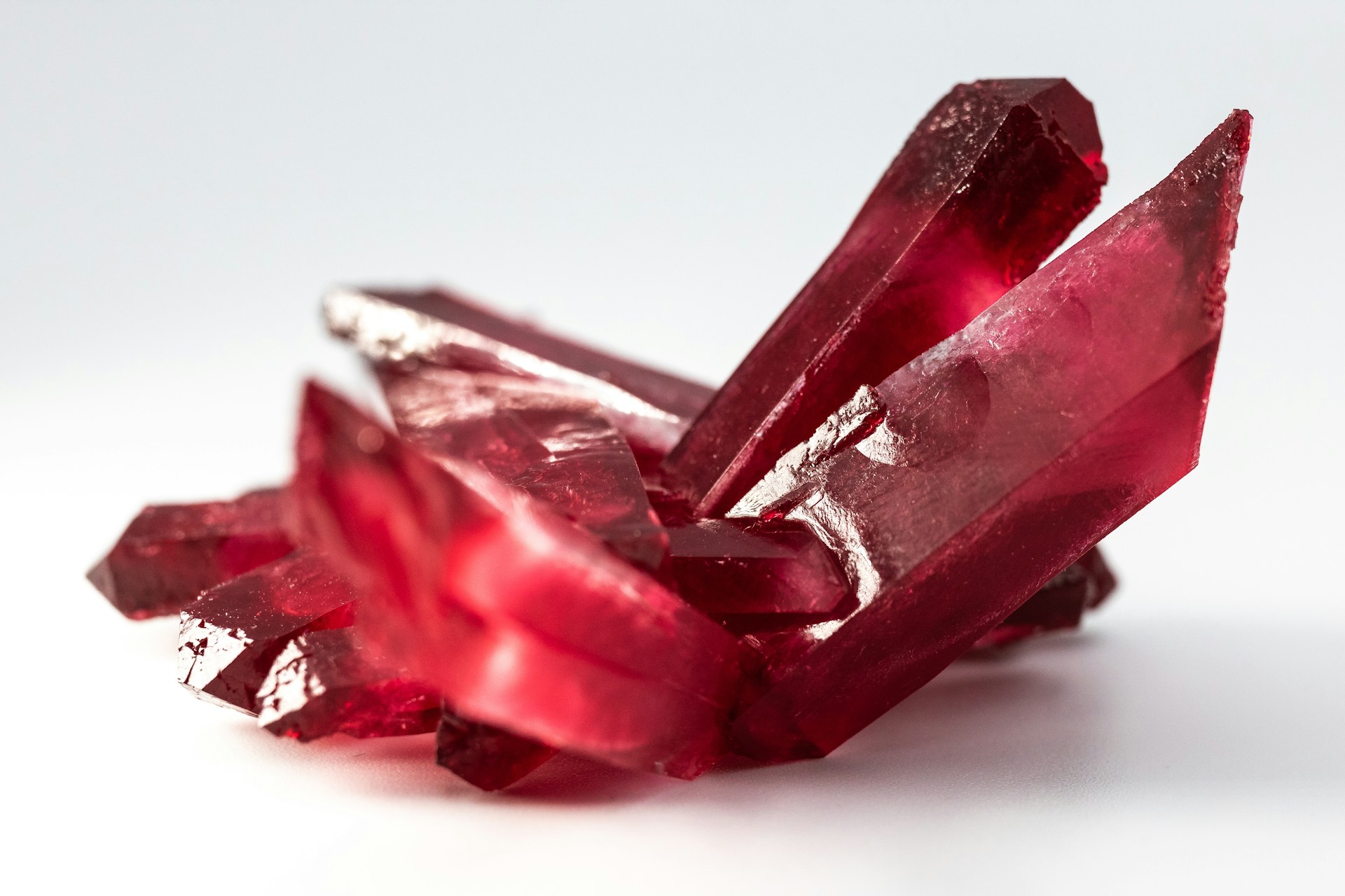 Closeup photo of rubies on a white background